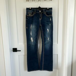 Seven boot cut jeans with unique stitching details